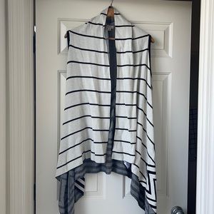 Sleeveless high/low sweater